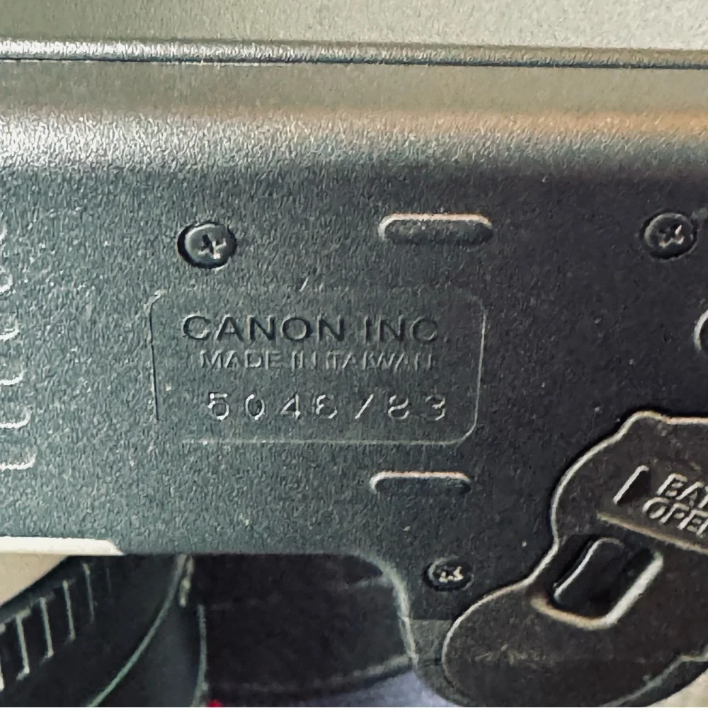 Canon Silver and Black Digital Camera with 75-300mm zoom lens